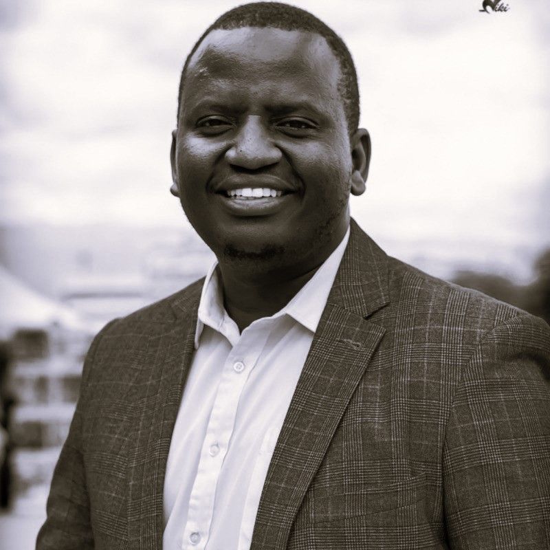 Professional headshot of Alex Kamau, OotuFund community advocate championing social justice and equality in East Africa